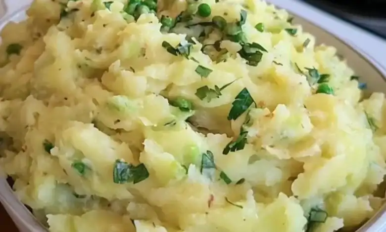 Creamy Mashed Potatoes with Fresh Herbs and Green Onions.